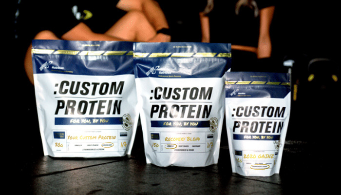3 different size bags of Custom Protein